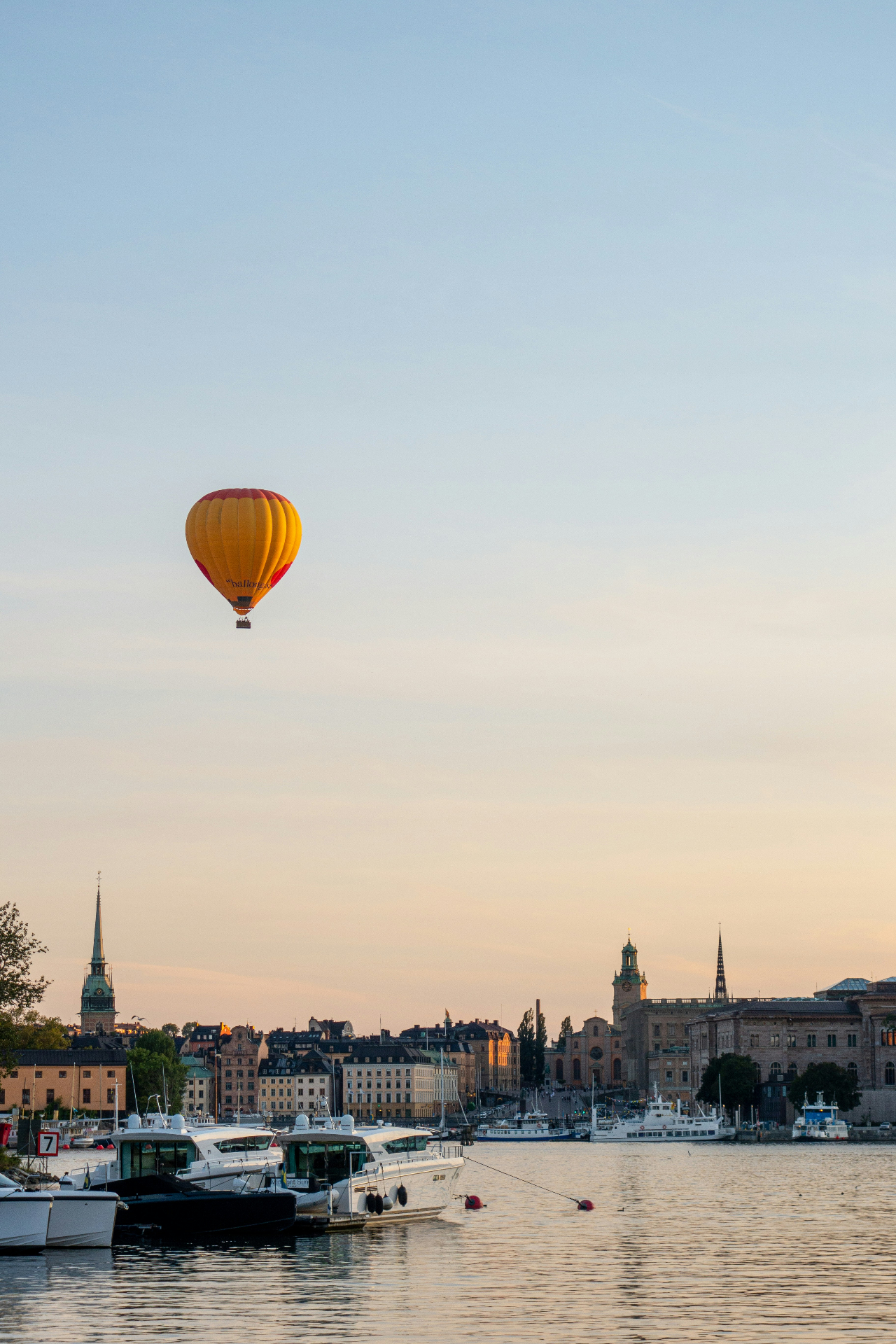 Hot air balloon over Stockholm at golden hour
